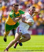 17 July 2016; Niall Sludden of Tyrone in action against Ciaran Gillespie of Donegal during the Ulster GAA Football Senior Championship Final match between Donegal and Tyrone at St Tiernach's Park in Clones, Co Monaghan. Photo by Philip Fitzpatrick/Sportsfile