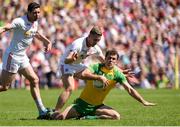 17 July 2016; Eamonn McGee of Donegal in action against Niall Sludden of Tyrone during the Ulster GAA Football Senior Championship Final match between Donegal and Tyrone at St Tiernach's Park in Clones, Co Monaghan. Photo by Oliver McVeigh/Sportsfile