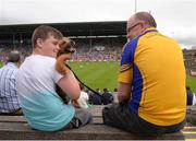 17 July 2016; Rory Bannon, left, and his uncle David O'Connor, from Knockcroghery, Roscommon, with Scruffy the Dog in attendance at the Connacht GAA Football Senior Championship Final Replay match between Galway and Roscommon at Elverys MacHale Park in Castlebar, Co Mayo. Photo by Piaras Ó Mídheach/Sportsfile