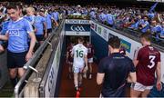 17 July 2016; Members of the Westmeath team leave down the tunnel as Dublin players celebrate  lifting the Delaney Cup afterthe Leinster GAA Football Senior Championship Final match between Dublin and Westmeath at Croke Park in Dubin. Photo by David Maher/Sportsfile