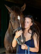 19 July 2016; Ciara Mullen, from Malahide, Co Dublin, with her horse Madam Stella, who will compete in the small and intermediate hunters, in the stables ahead of the Dublin Horse Show. RDS, Ballsbridge, Dublin. Photo by Cody Glenn/Sportsfile