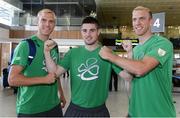 19 July 2016; Team Ireland boxer Joe Ward, centre, with hockey squad members Conor Harte and David Harte prior to their departure for the 2016 Olympic Games in Rio at Dublin Airport, Dublin. Photo by Brendan Moran/Sportsfile