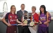 7 September 2010; In attendance at the Gala All-Ireland Camogie Championship Finals captain's photocall, from left, Galway captain Therese Maher, Gary Desmond, CEO of Gala, Joan O'Flynn, President of the Camogie Association, Wexford captain Una Lacey. The Premier Junior Final between Antrim and Waterford begins at 12noon, the Intermediate Final between Offaly and Wexford begins at 2pm and the Senior Final between Galway and Wexford begins at 4pm. The Gibson Hotel, Docklands, Dublin. Picture credit: Brendan Moran / SPORTSFILE