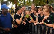 8 September 2010; Republic of Ireland players watch on as Harriet Scott drinks coconut water at Maracas Bay ahead of their second group stage game of the FIFA U-17 Women’s World Cup, against Canada, on Thursday. Republic of Ireland at the FIFA U-17 Women’s World Cup - Wednesday 8th September, Maracas Bay, Port of Spain, Trinidad. Picture credit: Stephen McCarthy / SPORTSFILE