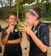 8 September 2010; Republic of Ireland captain Dora Gorman watches on as Jill Maloney tries some coconut water at Maracas Bay ahead of their second group stage game of the FIFA U-17 Women’s World Cup, against Canada, on Thursday. Republic of Ireland at the FIFA U-17 Women’s World Cup - Wednesday 8th September, Maracas Bay, Port of Spain, Trinidad. Picture credit: Stephen McCarthy / SPORTSFILE