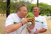 8 September 2010; Republic of Ireland assistant manager Harry Kenny, left, and manager Noel King try some coconut water at Maracas Bay ahead of their side's second group stage game of the FIFA U-17 Women’s World Cup, against Canada, on Thursday. Republic of Ireland at the FIFA U-17 Women’s World Cup - Wednesday 8th September, Maracas Bay, Port of Spain, Trinidad. Picture credit: Stephen McCarthy / SPORTSFILE