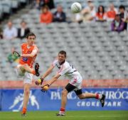 1 August 2010; Conor Gough, Armagh, in action against Kevin Fulignati, Cork. ESB GAA Football All-Ireland Minor Championship Quarter-Final, Cork v Armagh, Croke Park, Dublin. Picture credit: Oliver McVeigh / SPORTSFILE