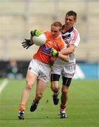 1 August 2010; Ryan Rafferty, Armagh, in action against Kevin Fulignati, Cork. ESB GAA Football All-Ireland Minor Championship Quarter-Final, Cork v Armagh, Croke Park, Dublin. Picture credit: Oliver McVeigh / SPORTSFILE