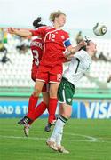 9 September 2010; Jennifer Byrne, Republic of Ireland, in action against Jade Kovacevic, 3, and Nicole Setterlund, Canada. FIFA U-17 Women’s World Cup Group Stage, Republic of Ireland v Canada, Larry Gomes Stadium, Arima, Trinidad. Picture credit: Stephen McCarthy / SPORTSFILE