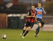 10 September 2010; Killian Brennan, Bohemians, in action against Paul Corry, UCD. Airtricity League Premier Division, Bohemians v UCD, Dalymount Park, Dublin. Picture credit: Barry Cregg / SPORTSFILE