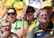 17 July 2016; A Donegal supporter shelters from the sun during the Ulster GAA Football Senior Championship Final match between Donegal and Tyrone at St Tiernach's Park in Clones, Co Monaghan. Photo by Oliver McVeigh/Sportsfile