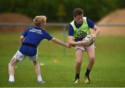 20 July 2016; Eoin Brophy, aged 12, from Tullow, Co. Carlow, is tackled by James Hickey, aged 12, from Grange, Co. Carlow during the Bank of Ireland Leinster Rugby Summer Camp at Tullow RFC in Tullow, Co Carlow. Photo by Daire Brennan/Sportsfile