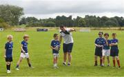 20 July 2016; Peter Dooley of Leinster gives instructions to Rory Flood, aged 8, from Donard, Co. Wicklow, during the Bank of Ireland Leinster Rugby Summer Camp at Tullow RFC in Tullow, Co Carlow. Photo by Daire Brennan/Sportsfile