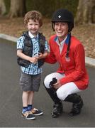 20 July 2016; Brendan Williams, age 5, from Ashby, England, meets Jessica Springsteen after she competed in the Speed Stakes at the Dublin Horse Show in the RDS, Ballsbridge, Dublin. Photo by Cody Glenn/Sportsfile