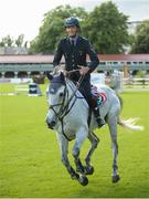 20 July 2016; Lorenzo DeLuca, Italy, takes a lap of honour after winning the Sports Ireland Classic on Limestone Grey at the Dublin Horse Show in the RDS, Ballsbridge, Dublin. Photo by Cody Glenn/Sportsfile