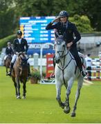 20 July 2016; Lorenzo DeLuca, Italy, takes a lap of honour after winning the Sports Ireland Classic on Limestone Grey at the Dublin Horse Show in the RDS, Ballsbridge, Dublin. Photo by Cody Glenn/Sportsfile