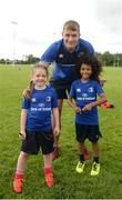 21 July 2016; Ross Molony of Leinster with Jessica Delaney, left, aged 6, from Portlaoise, Co. Laois, and Zion Onalimi, aged 7, from Mountmellick, Co. Laois, during the Bank of Ireland Leinster Rugby Summer Camp at Portlaoise RFC in Portlaoise, Co. Laois. Photo by Daire Brennan/Sportsfile