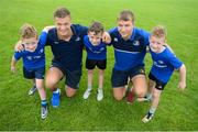 21 July 2016; Josh van der Flier, left, and Ross Molony of Leinster with triplets, left to right, Jack, Conor and Liam Dermody, aged 8, from Portlaoise, Co. Laois, during the Bank of Ireland Leinster Rugby Summer Camp at Portlaoise RFC in Portlaoise, Co. Laois. Photo by Daire Brennan/Sportsfile