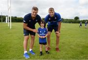 21 July 2016; Josh van der Flier, left, and Ross Molony of Leinster with Alex Vaughan, aged 6, from Borris-in-Ossory, Co. Laois, during the Bank of Ireland Leinster Rugby Summer Camp at Portlaoise RFC in Portlaoise, Co. Laois. Photo by Daire Brennan/Sportsfile