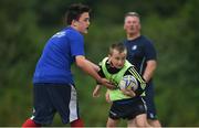 21 July 2016; Sean Phelan, aged 12, from Barrowhouse, Co. Laois, in action against Michael Ging, aged 12, from New York, during the Bank of Ireland Leinster Rugby Summer Camp at Portlaoise RFC in Portlaoise, Co. Laois. Photo by Daire Brennan/Sportsfile
