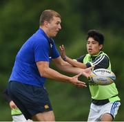 21 July 2016; Ross Molony of Leinster in action against Josh Dunne, aged 12, from Portarlington, Co. Laois, during the Bank of Ireland Leinster Rugby Summer Camp at Portlaoise RFC in Portlaoise, Co. Laois. Photo by Daire Brennan/Sportsfile