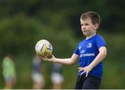 21 July 2016; Sam O'Shea, aged 7, from Portlaoise, Co. Laois, in action during the Bank of Ireland Leinster Rugby Summer Camp at Portlaoise RFC in Portlaoise, Co. Laois. Photo by Daire Brennan/Sportsfile