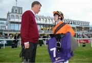 21 July 2016; Jockey Gary Carroll in conversation with trainer Thomas Mullins after winning the Booka Brass Band Handicap during the Bulmers Evening Meeting at Leopardstown in Dublin. Photo by Cody Glenn/Sportsfile