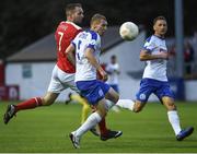 21 July 2016; Conan Byrne of St Patrick's Athletic in action against Yury Astraukh of Dinamo Minsk during the UEFA Europa League Second Qualifying Round 2nd Leg match between St Patrick's Athletic and Dinamo Minsk at Richmond Park in Inchicore, Dublin. Photo by David Maher/Sportsfile