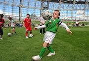 11 September 2010; Jack Burke, age 7, from Dublin, shows off his skills at the launch of the FAI Football for All Club Programme. Aviva Stadium, Lansdowne Road, Dublin. Picture credit: David Maher / SPORTSFILE