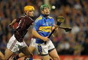 11 September 2010; John O'Dwyer, Tipperary, in action against Johnnie Coen, Galway. Bord Gais Energy GAA Hurling Under 21 All-Ireland Championship Final, Tipperary v Galway, Semple Stadium, Thurles, Co. Tipperary. Picture credit: Ray McManus / SPORTSFILE