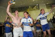 11 September 2010; Tipperary players Sean Carey, left, Bill McCormack, 16, and James Logue celebrate in the dressing room. Bord Gais Energy GAA Hurling Under 21 All-Ireland Championship Final, Tipperary v Galway, Semple Stadium, Thurles, Co. Tipperary. Picture credit: Ray McManus / SPORTSFILE