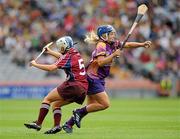 12 September 2010; Katrina Parrock, Wexford, in action against Regina Glynn, Galway. Gala All-Ireland Senior Camogie Championship Final, Galway v Wexford, Croke Park, Dublin. Picture credit: Oliver McVeigh / SPORTSFILE