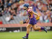 12 September 2010; Katrina Parrock, Wexford, turns to celebrate after scoring her side's first goal. Gala All-Ireland Senior Camogie Championship Final, Galway v Wexford, Croke Park, Dublin. Picture credit: Oliver McVeigh / SPORTSFILE