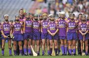 12 September 2010; Members of the  Wexford panel stand together during the playing of the National Anthem. Gala All-Ireland Senior Camogie Championship Final, Galway v Wexford, Croke Park, Dublin. Picture credit: David Maher / SPORTSFILE