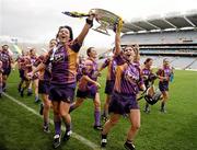 12 September 2010; Wexford captain Una Leacy, left, and Michelle O'Leary celebrate with the O'Duffy Cup. Gala All-Ireland Senior Camogie Championship Final, Galway v Wexford, Croke Park, Dublin. Photo by Sportsfile