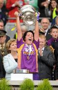 12 September 2010; Una Lacey, Wexford, holds aloft the O'Duffy cup. Gala All-Ireland Senior Camogie Championship Final, Galway v Wexford, Croke Park, Dublin. Picture credit: Oliver McVeigh / SPORTSFILE
