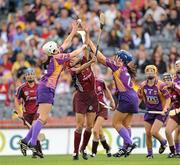 12 September 2010; Therese Maher, Galway, in action against Mary Lacey and Aoife O'Connor, right, Wexford. Gala All-Ireland Senior Camogie Championship Final, Galway v Wexford, Croke Park, Dublin. Picture credit: Oliver McVeigh / SPORTSFILE
