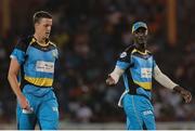 21 July 2016; Zouks captain Daren Sammy (R) gives Morne Morkel (L)  some advice during Match 21 of the Hero Caribbean Premier League match between the St Lucia Zouks and the Nevis Patriots at the Daren Sammy Cricket Stadium, Gros Islet, St Lucia.  Photo by Ashley Allen/Sportsfile