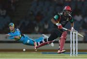 21 July 2016; Zouks fielder David Miller (L) is airborne as he attempts to run out Evin Lewis (R) during Match 21 of the Hero Caribbean Premier League match between the St Lucia Zouks and the Nevis Patriots at the Daren Sammy Cricket Stadium, Gros Islet, St Lucia.  Photo by Ashley Allen/Sportsfile