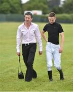 21 July 2016; Young jockey Andrew Breslin walks the course with jockey coach Warren O'Connor ahead of the Bulmers Evening Meeting at Leopardstown in Dublin. Photo by Cody Glenn/Sportsfile