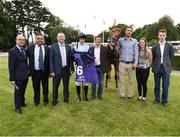 21 July 2016; Jockey Denis Linehan, trainer Johnny Murtagh, fifth from left, and winning connections of Windsor Beach following the Morocco Sorec Apprentice Handicap during the Bulmers Evening Meeting at Leopardstown in Dublin. Photo by Cody Glenn/Sportsfile