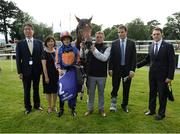21 July 2016; Jockey Ryan Moore, trainer Aidan O'Brien, right, and winning connections of Churchill following the Japan Racing Association Tyros Stakes during the Bulmers Evening Meeting at Leopardstown in Dublin. Photo by Cody Glenn/Sportsfile