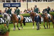 22 July 2016; Members of the Ireland team, from left, Bertram Allen, Cian O'Connor, Denis Lynch and Greg Broderick enter the main arena with Chef d'Equipe Robert Splain after placing second in a jump-off against Italy following the Furusiyya FEI Nations Cup presented by Longines at the Dublin Horse Show in the RDS, Ballsbridge, Dublin. Photo by Cody Glenn/Sportsfile