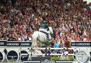 22 July 2016; A large crowd watches Bertram Allen, Ireland, compete on Hector van D'Abdijhoeve during the Furusiyya FEI Nations Cup presented by Longines at the Dublin Horse Show in the RDS, Ballsbridge, Dublin. Photo by Cody Glenn/Sportsfile