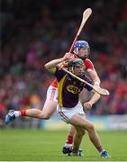 9 July 2016; Eanna Martin of Wexford in action against Patrick Horgan of Cork during the GAA Hurling All-Ireland Senior Championship Round 2 match between Cork and Wexford at Semple Stadium in Thurles, Tipperary. Photo by Stephen McCarthy/Sportsfile