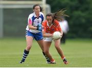 23 July 2016; Megan Sheridan of Armagh in action against Louise Ryan of Waterford during the TG4 Ladies Football All-Ireland Senior Championship Preliminary Round match between Armagh and Waterford at Conneff Park in Clane, Co Kildare. Photo by Eóin Noonan/Sportsfile
