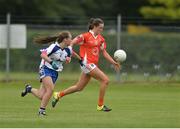 23 July 2016; Aimee Mackin of Armagh in action against Megan Dunford of Waterford during the TG4 Ladies Football All-Ireland Senior Championship Preliminary Round match between Armagh and Waterford at Conneff Park in Clane, Co Kildare. Photo by Eóin Noonan/Sportsfile