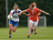 23 July 2016; Lauren McGregor of Waterford in action against Caoimhe Morgan of Armagh during the TG4 Ladies Football All-Ireland Senior Championship Preliminary Round match between Armagh and Waterford at Conneff Park in Clane, Co Kildare. Photo by Eóin Noonan/Sportsfile