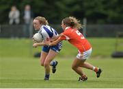 23 July 2016; Caoimhe McGrath of Waterford in action against Sharon Reel of Armagh during the TG4 Ladies Football All-Ireland Senior Championship Preliminary Round match between Armagh and Waterford at Conneff Park in Clane, Co Kildare. Photo by Eóin Noonan/Sportsfile