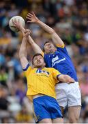 23 July 2016; Cathal Cregg of Roscommon in action against Kevin Hartnett of Clare during the GAA Football All-Ireland Senior Championship, Round 4A, game between Clare and Roscommon at Pearse Stadium in Salthill, Galway. Photo by Brendan Moran/Sportsfile